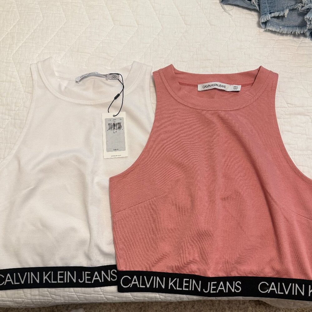 2 Calvin Klein cropped tops